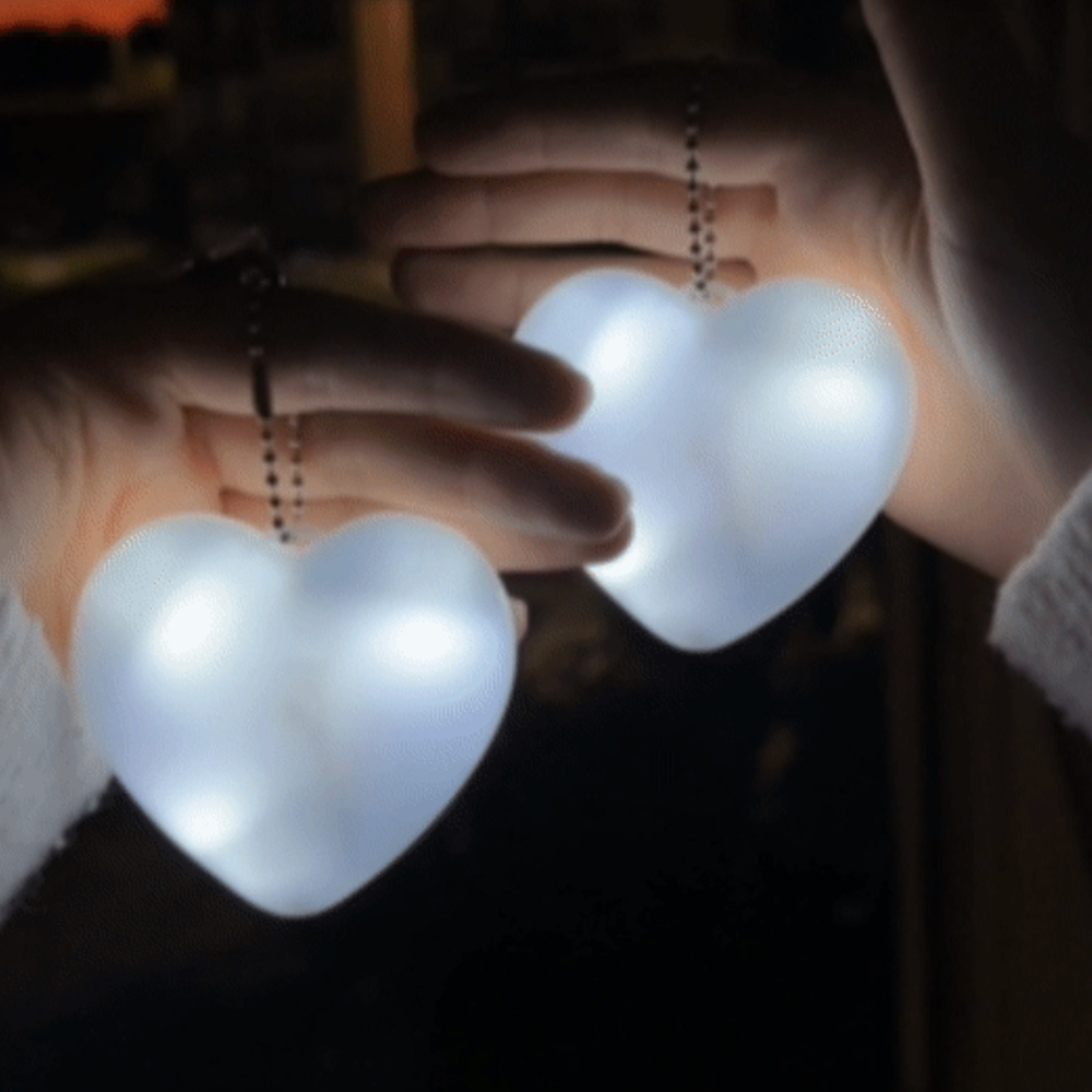 Heart or Round Shaped LED Purse Light - Kim’s Signature Beauty & Accessories (Store description)