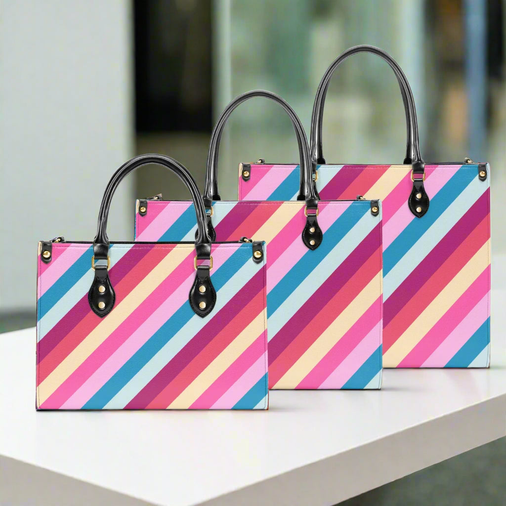 Rainbow Stripe PU Leather Handbag - Kim’s Signature Beauty & Accessories (Store description)