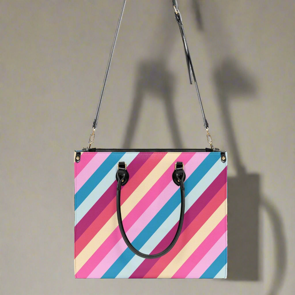 Rainbow Stripe PU Leather Handbag - Kim’s Signature Beauty & Accessories (Store description)