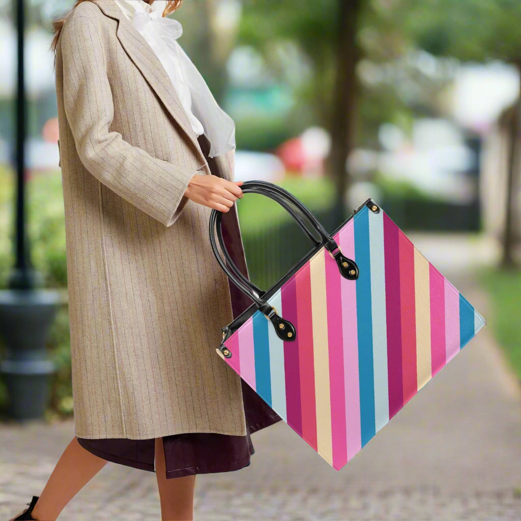 Rainbow Stripe PU Leather Handbag - Kim’s Signature Beauty & Accessories (Store description)