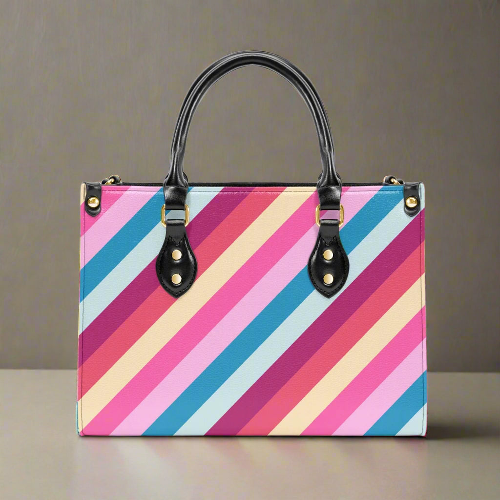 Rainbow Stripe PU Leather Handbag - Kim’s Signature Beauty & Accessories (Store description)