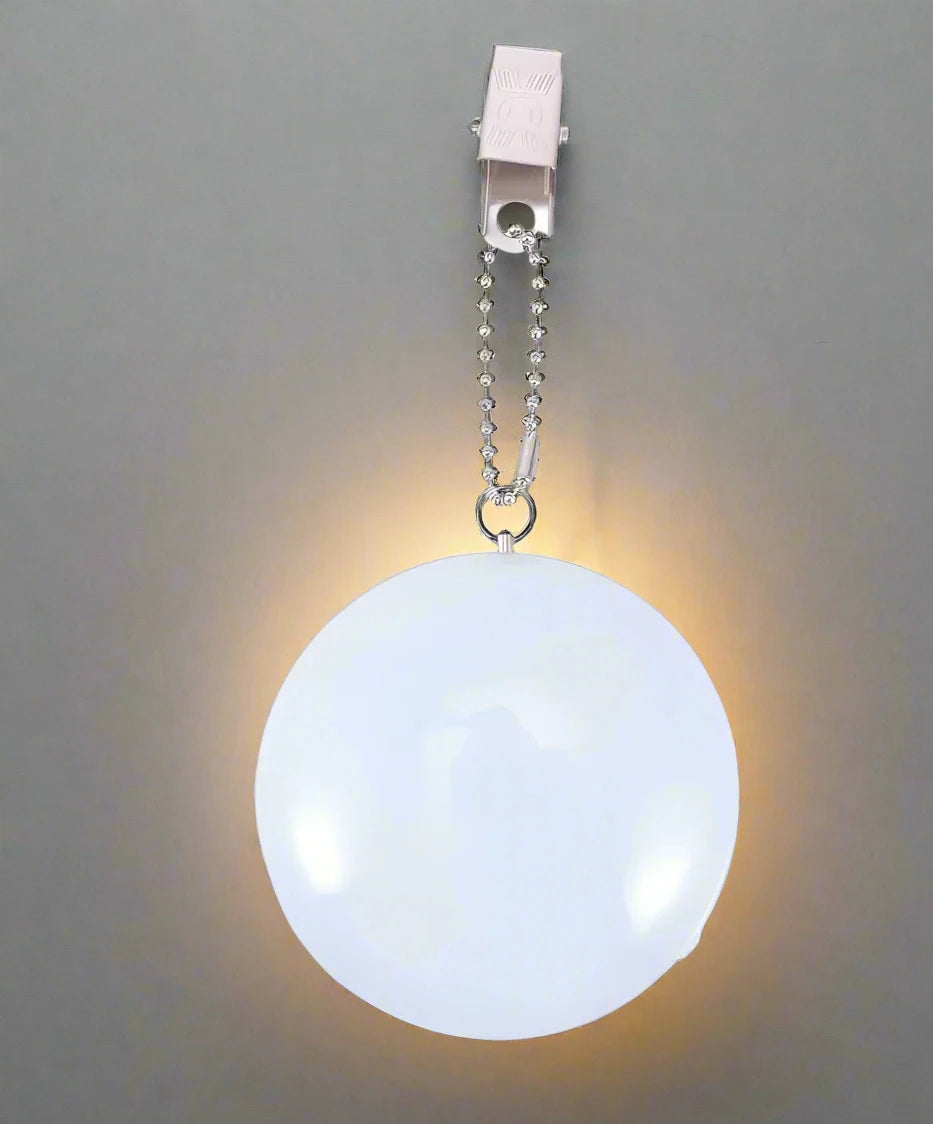 Heart or Round Shaped LED Purse Light - Kim’s Signature Beauty & Accessories (Store description)