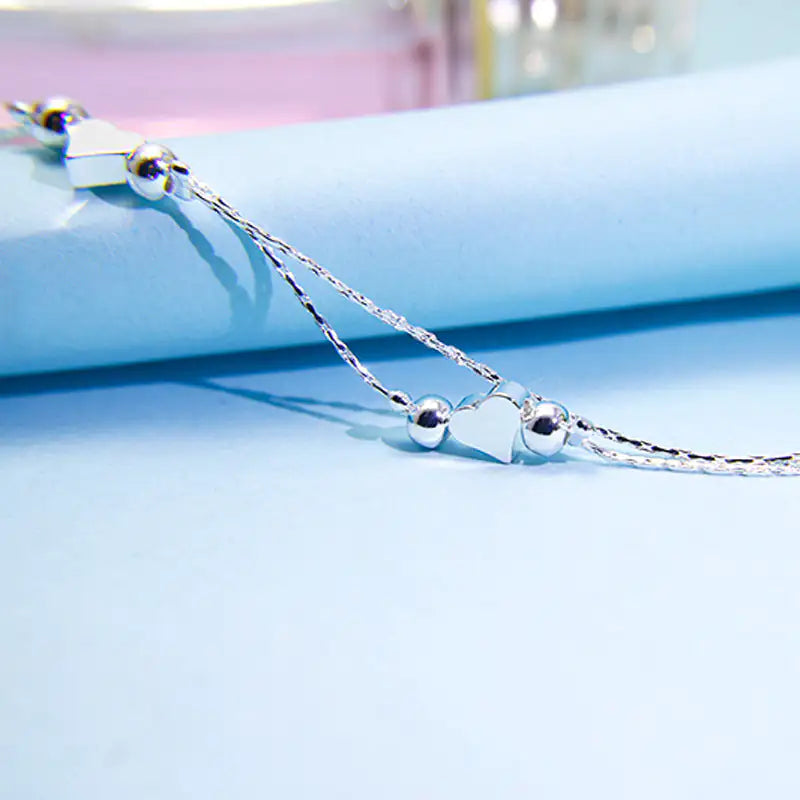 Double Layered Heart Bracelet - Kim’s Signature Beauty & Accessories    (Store description)