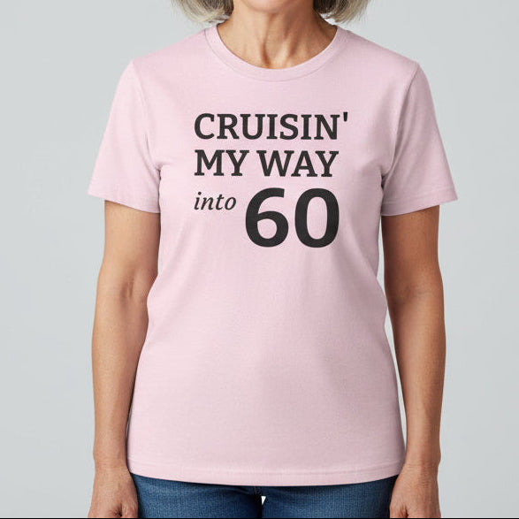 Pink t-shirt with 'Cruisin' My Way into 60' text on a white background