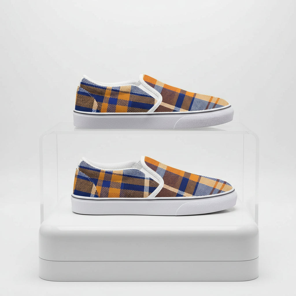 Plaid slip-on shoes with orange, blue, and brown pattern on a white background