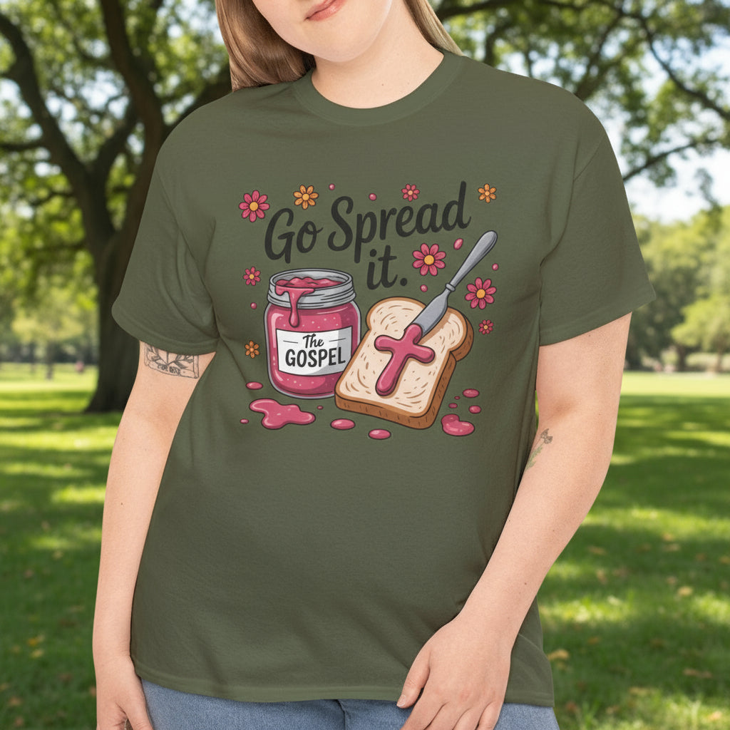 Person wearing a green t-shirt with a graphic design in a park