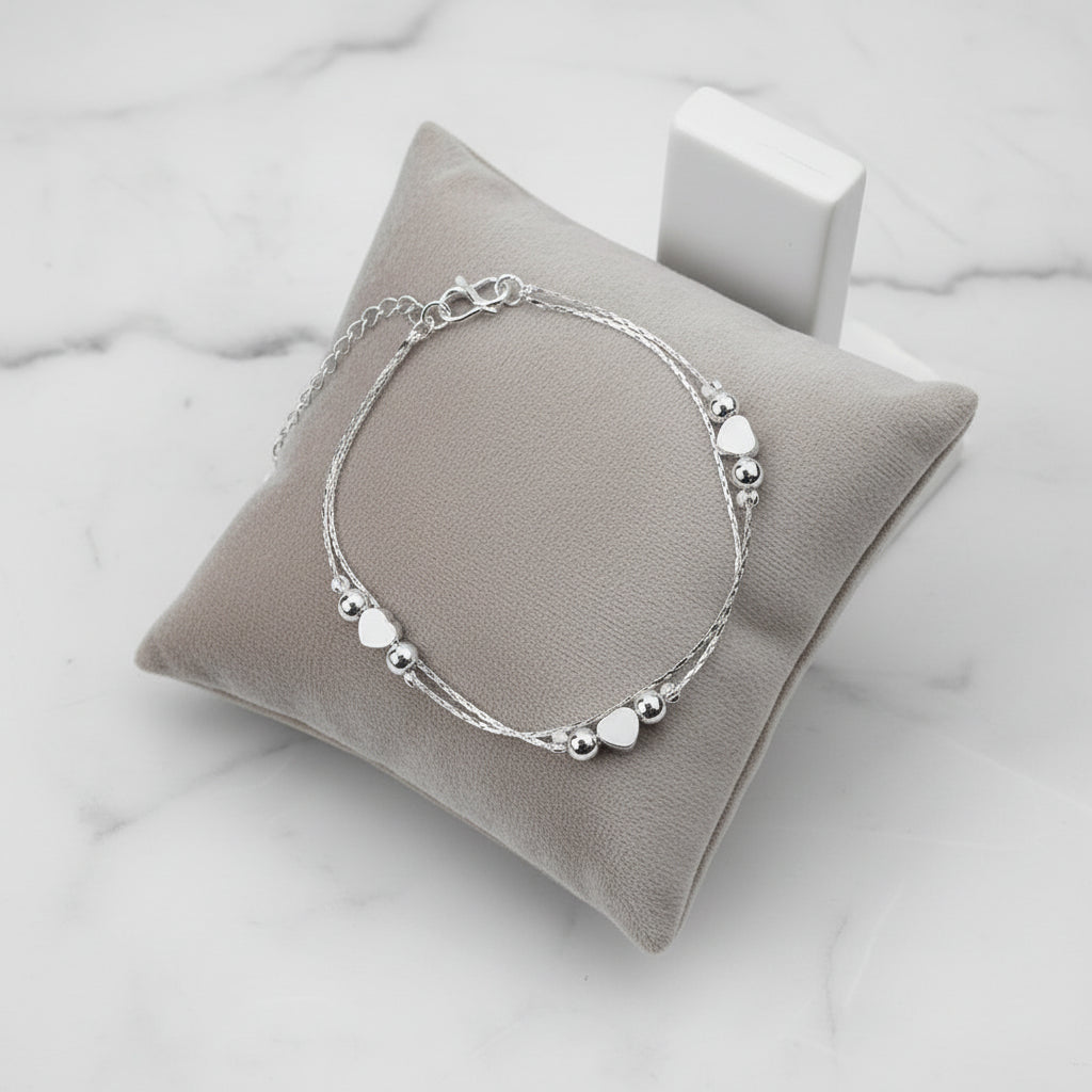 Double Layered Heart Bracelet - Kim’s Signature Beauty & Accessories    (Store description)