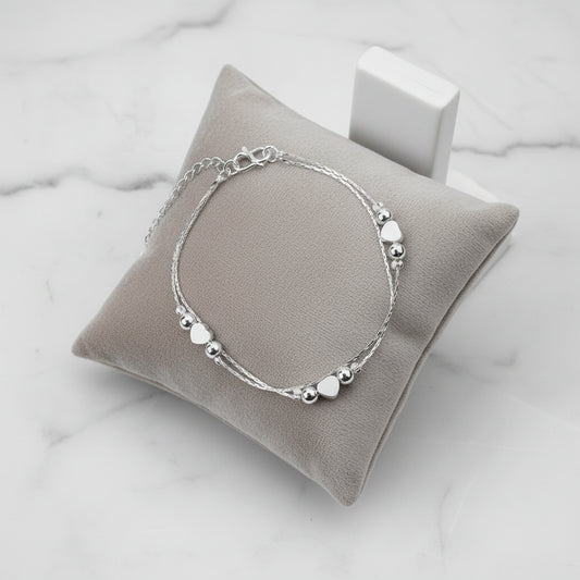 Double Layered Heart Bracelet - Kim’s Signature Beauty & Accessories    (Store description)