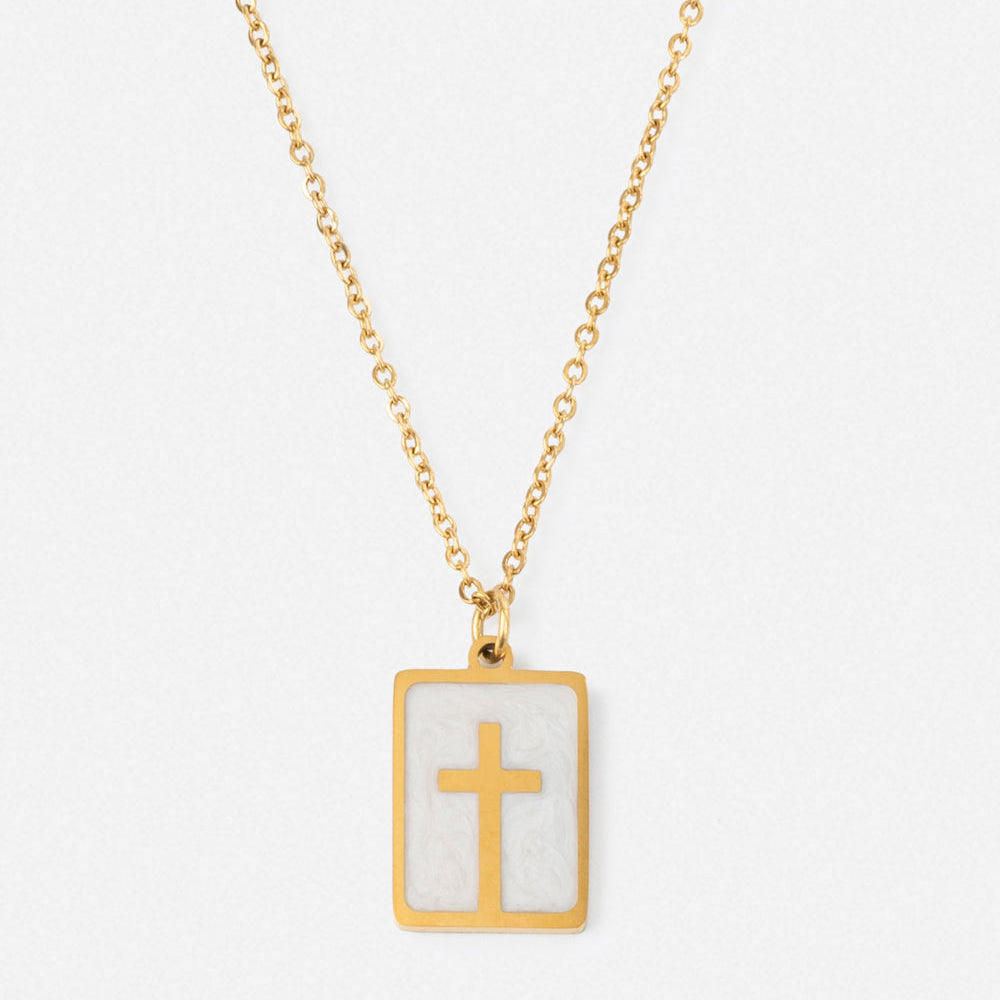 Necklace with a gold cross pendant on a white background