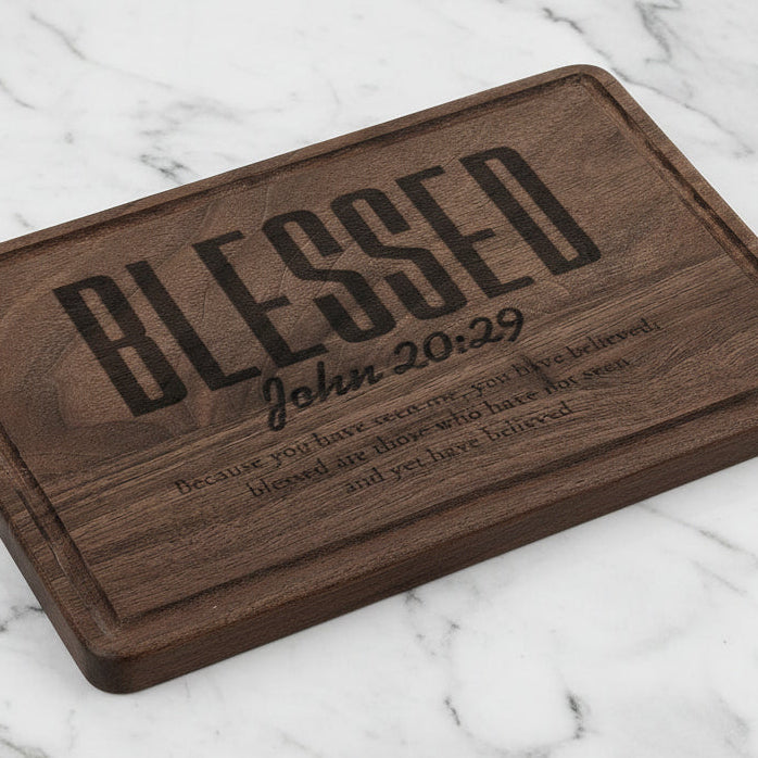 Wooden plaque with engraved text 'Blessed John 20:29' on a white background
