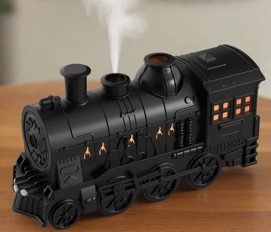 Train-Shaped Ultrasonic Diffuser – Aromatherapy Humidifier w/LED Light - Kim’s Signature Beauty & Accessories    (Store description)