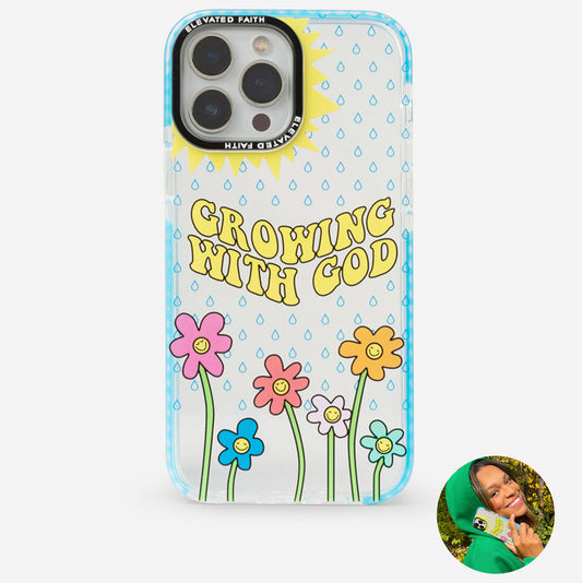 Phone case with floral design and text 'Growing with God' on a white background