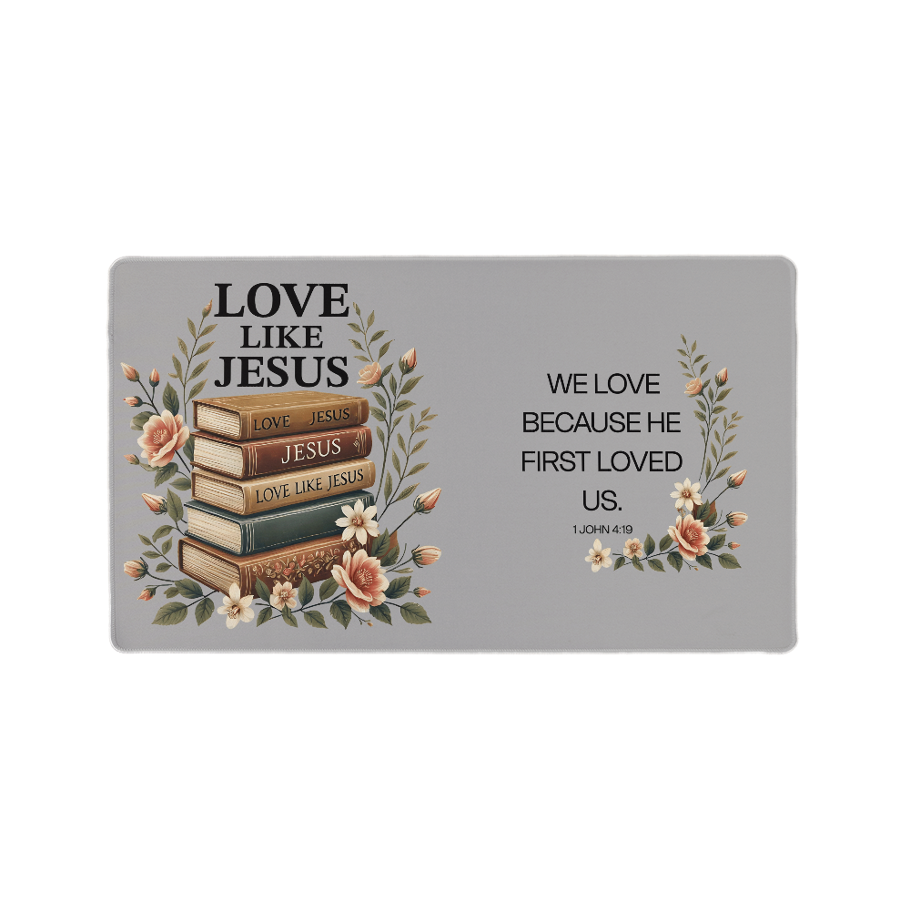 1 John 4:19 We Love Desk Mat