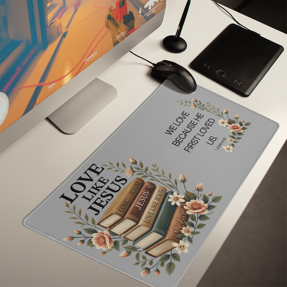 1 John 4:19 We Love Desk Mat