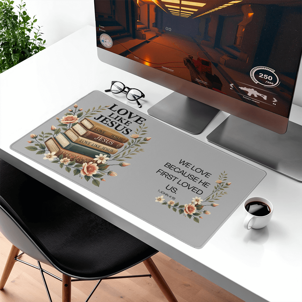 1 John 4:19 We Love Desk Mat