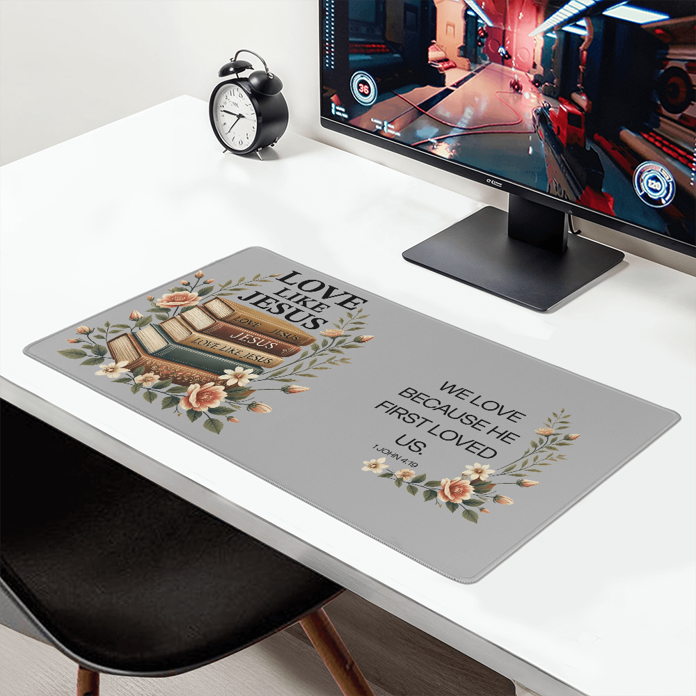 1 John 4:19 We Love Desk Mat