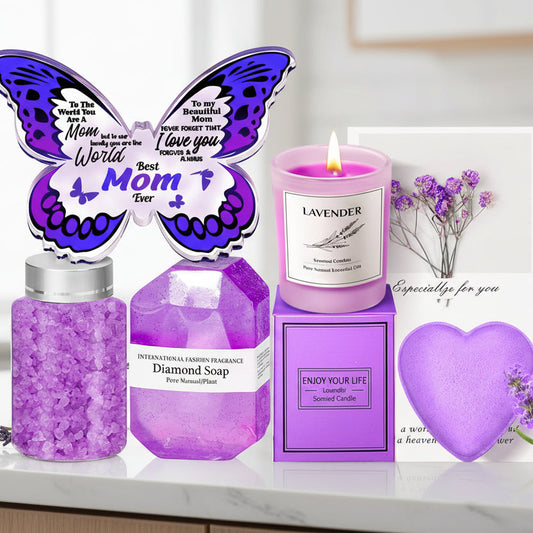 Purple gift set with soap, candle, and butterfly-shaped card in a decorative box.