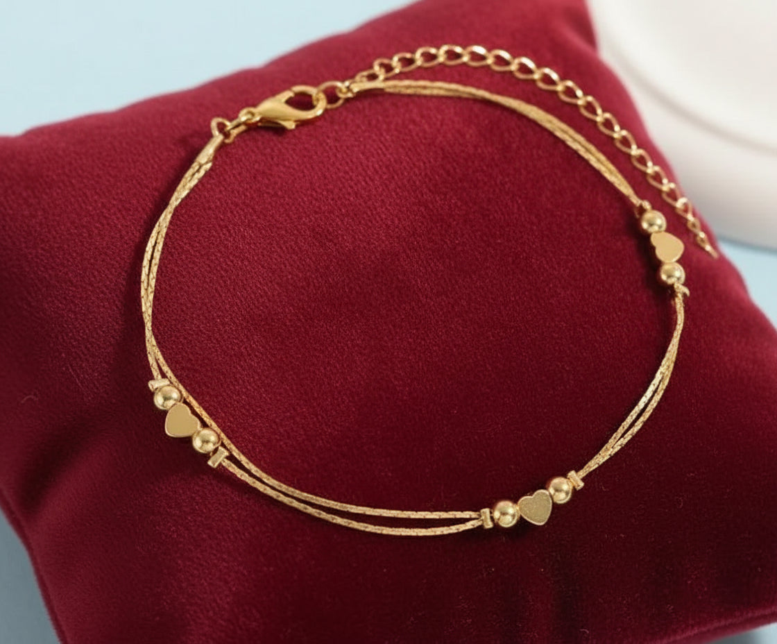 Double Layered Heart Bracelet - Kim’s Signature Beauty & Accessories    (Store description)