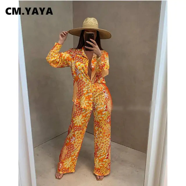 Button Up Blouse and Pants - Kim’s Signature Beauty & Accessories    (Store description)