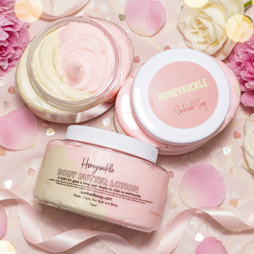 Two jars of Honeysuckle body butter lotion on a white background