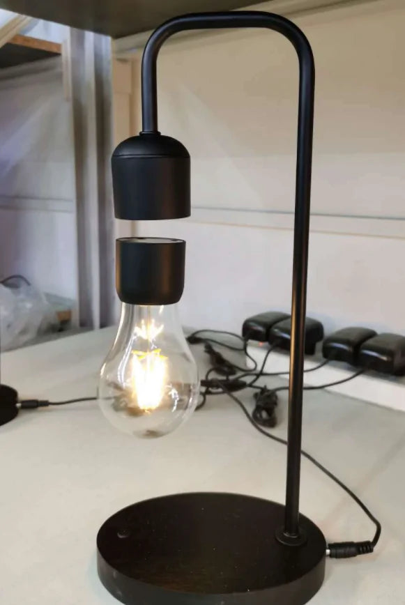 Levitating Moon Lamp and Floating Bulb - Kim’s Signature Beauty & Accessories    (Store description)