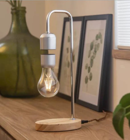 Levitating Moon Lamp and Floating Bulb - Kim’s Signature Beauty & Accessories    (Store description)