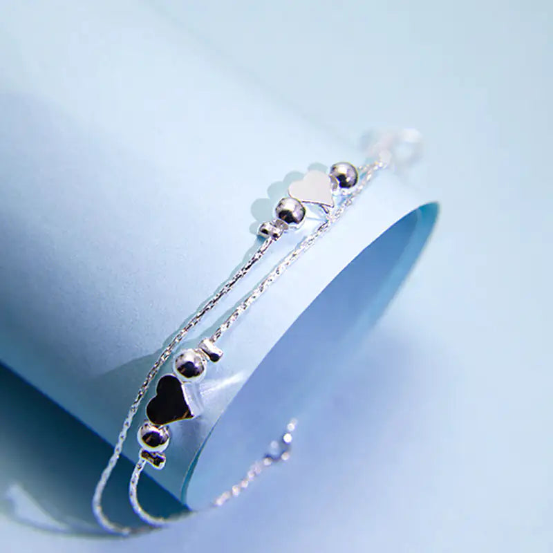 Double Layered Heart Bracelet - Kim’s Signature Beauty & Accessories    (Store description)