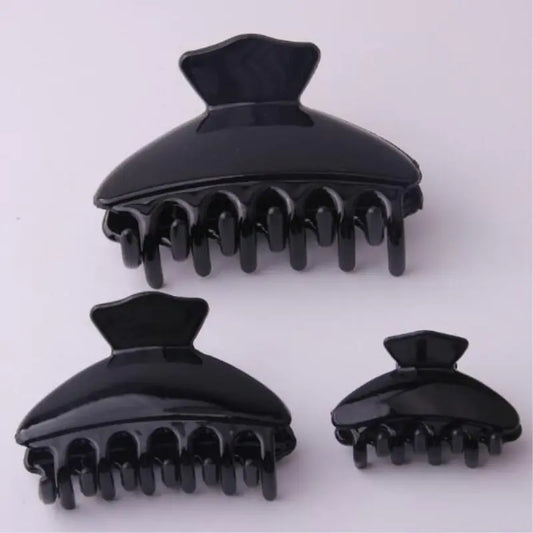 Shiny Spray Hair Clip, Black Shell Ponytail Holder - Kim’s Signature Beauty & Accessories    (Store description)